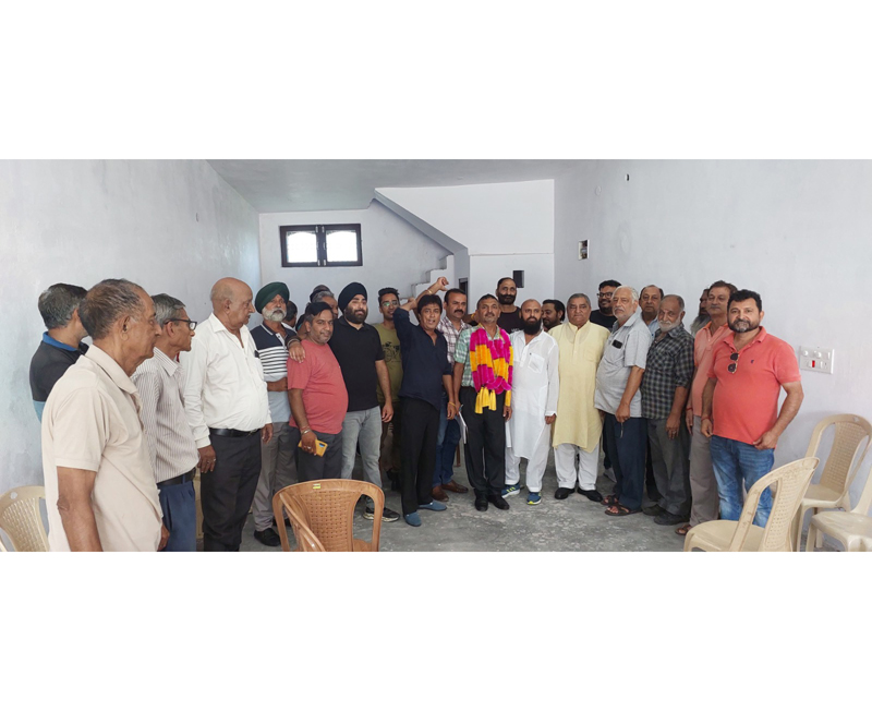 Members of Jammu City Ration Dealers Union posing for a group photograph after a meeting on Sunday. Members of Jammu City Ration Dealers Union posing for a group photograph after a meeting on Sunday.