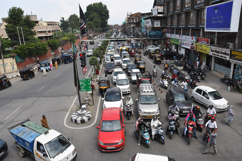 Markets remain bustling with heavy traffic witnessed on roads in Srinagar on Saturday on fourth anniversary of Article 370 abrogation. -Excelsior/Shakeel Markets remain bustling with heavy traffic witnessed on roads in Srinagar on Saturday on fourth anniversary of Article 370 abrogation. -Excelsior/Shakeel