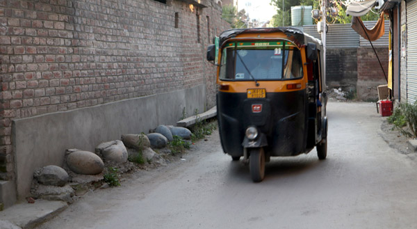Stones lined up along the wall on an interior road in Natipora hampering smooth movement. -Excelsior/Shakeel Stones lined up along the wall on an interior road in Natipora hampering smooth movement. -Excelsior/Shakeel