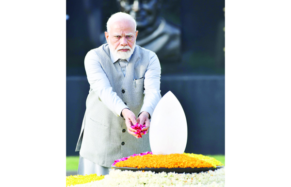 Prime Minister Narendra Modi pays tribute to former Prime Minister Atal Bihari Vajpayee on his death anniversary at his memorial Sadaiv Atal, in New Delhi on Wednesday. (UNI) Prime Minister Narendra Modi pays tribute to former Prime Minister Atal Bihari Vajpayee on his death anniversary at his memorial Sadaiv Atal, in New Delhi on Wednesday. (UNI)