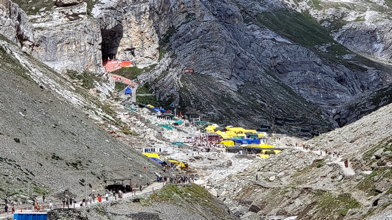 Yatris trekking a hill on way to holy cave of Amarnath on Friday. -Excelsior/Photo Yatris trekking a hill on way to holy cave of Amarnath on Friday. -Excelsior/Photo