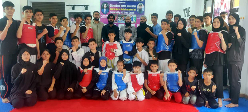 Budding Wushu players posing with dignitaries at Doda on Sunday. Budding Wushu players posing with dignitaries at Doda on Sunday.