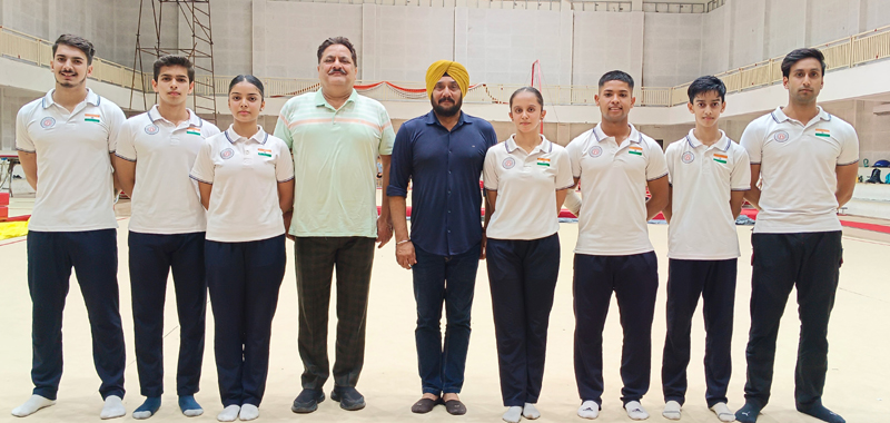 Gymnasts posing for photograph along with President GAJK Er Kiran Wattal and Coach S P Singh. Gymnasts posing for photograph along with President GAJK Er Kiran Wattal and Coach S P Singh.