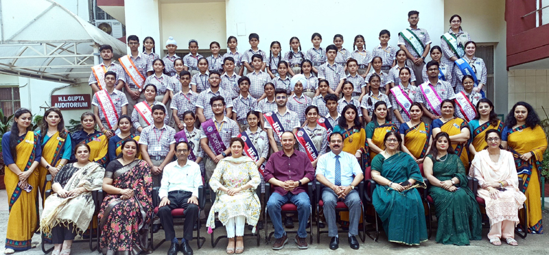 Newly elected students council members along with MIER school management posing for a group photograph. Newly elected students council members along with MIER school management posing for a group photograph.