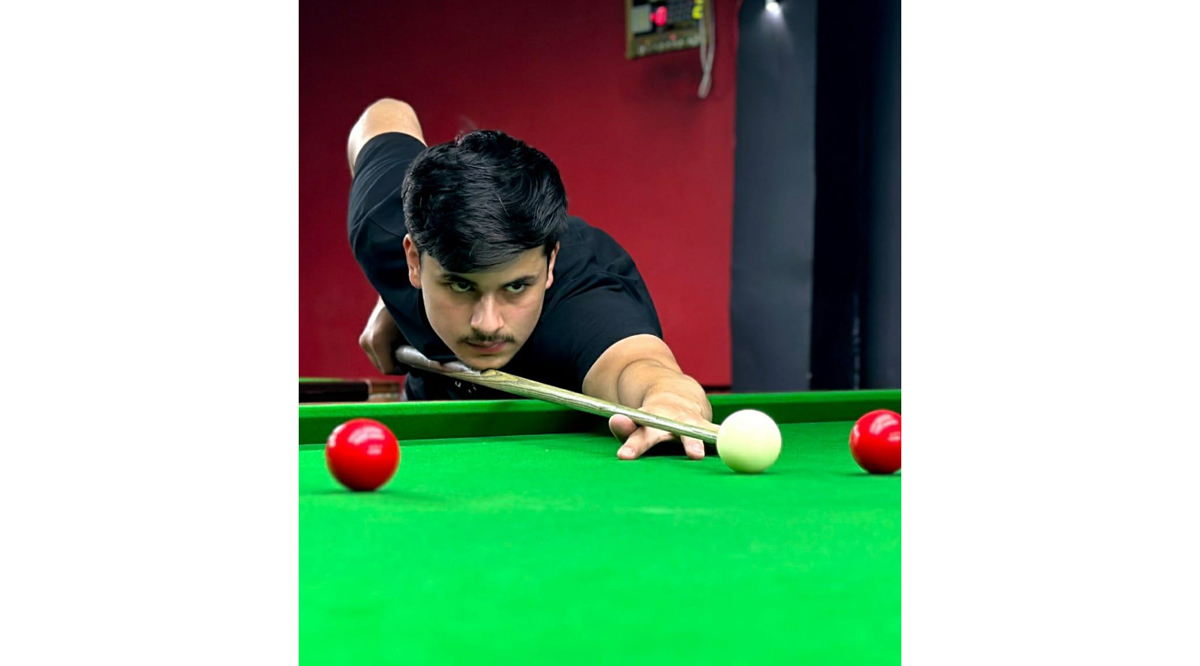 Kamran Majid aiming for target during junior snooker final match in Srinagar on Saturday. Kamran Majid aiming for target during junior snooker final match in Srinagar on Saturday.