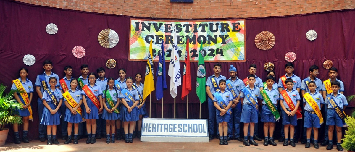 Students of Heritage School posing for a group photograph during Investiture Ceremony. Students of Heritage School posing for a group photograph during Investiture Ceremony.