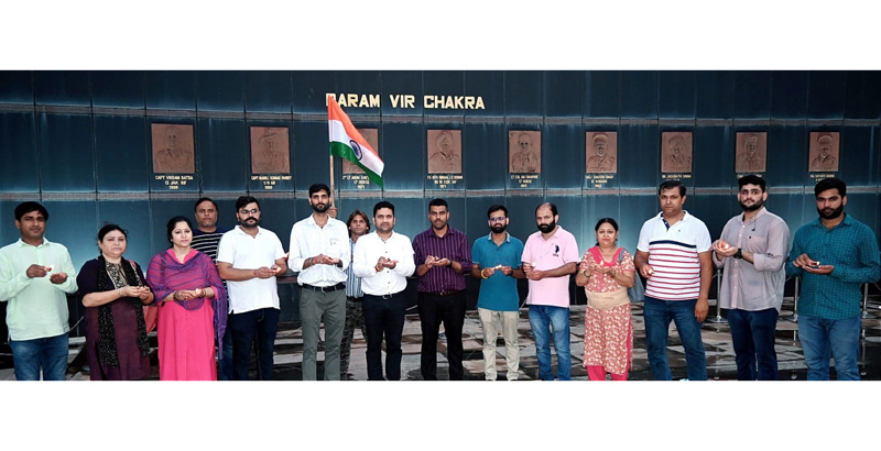 Officers of Information Department lighting lamps to pay tribute to martyrs of the nation in Jammu on Saturday. Officers of Information Department lighting lamps to pay tribute to martyrs of the nation in Jammu on Saturday.