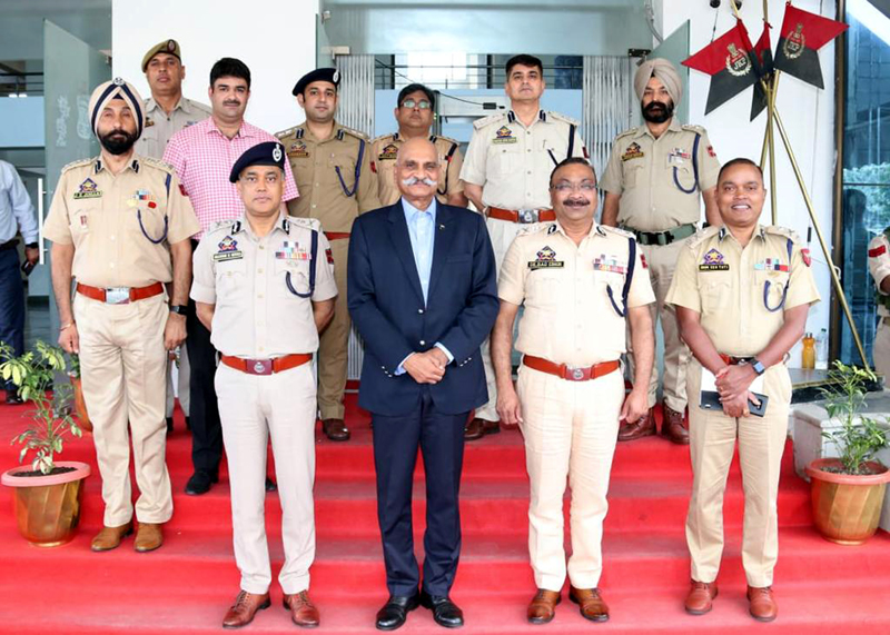 Former DGP K Rajendra (in the centre) and incumbent Police Chief Dilbag Singh along with other police officers posing for a photograph in Srinagar on Monday. Former DGP K Rajendra (in the centre) and incumbent Police Chief Dilbag Singh along with other police officers posing for a photograph in Srinagar on Monday.