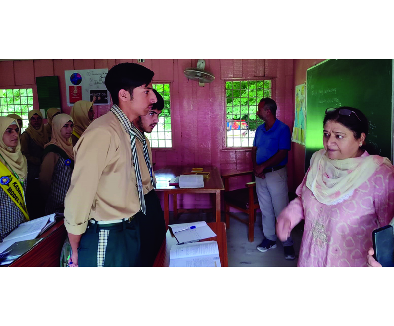 KU Vice-Chancellor inspecting university school to ascertain status of class work. KU Vice-Chancellor inspecting university school to ascertain status of class work.