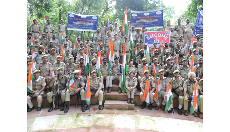 Cops with their officers posing for a group photograph after a road march in Jammu on Saturday. Cops with their officers posing for a group photograph after a road march in Jammu on Saturday.