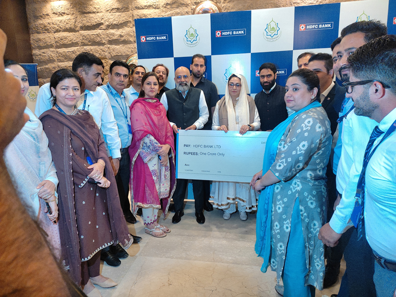 Waqf Board Chairperson, Dr Darakhshan Andrabi handing cheque worth Rs 1 crore to HDFC Bank Vice President during signing of MoU at Srinagar. Waqf Board Chairperson, Dr Darakhshan Andrabi handing cheque worth Rs 1 crore to HDFC Bank Vice President during signing of MoU at Srinagar.