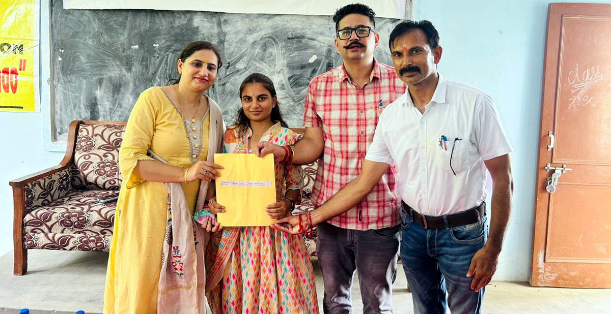 Appointment letter being given to a newly recruited Sangini at Dansal on Tuesday. Appointment letter being given to a newly recruited Sangini at Dansal on Tuesday.