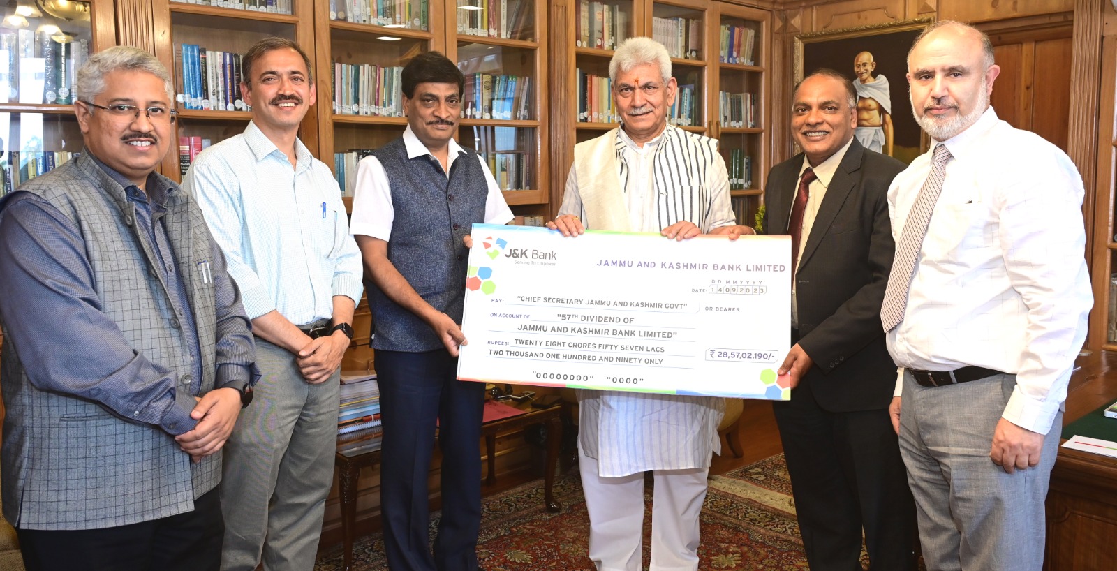 J&K Bank presents dividend cheques to Lt Governor Manoj Sinha
