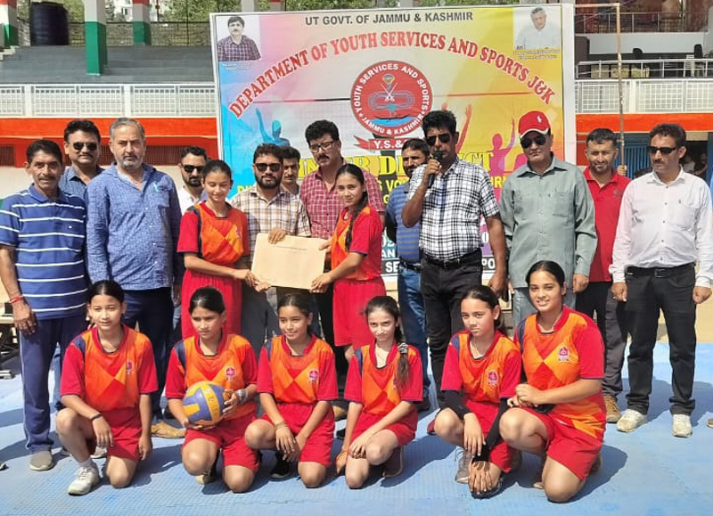 Girls’ Under-14 Volleyball team posing with dignitaries in Doda on Thursday. -Excelsior/Talak Raj Girls’ Under-14 Volleyball team posing with dignitaries in Doda on Thursday. -Excelsior/Talak Raj