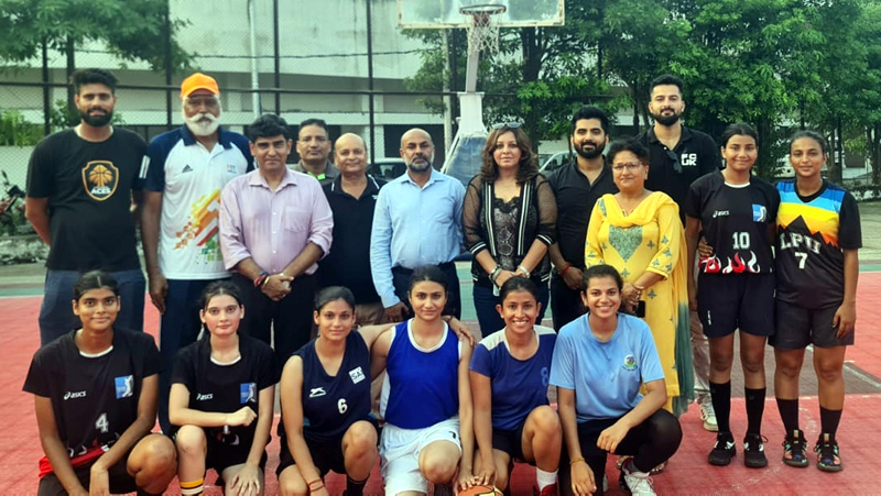 Basketball players posing with dignitaries. Basketball players posing with dignitaries.