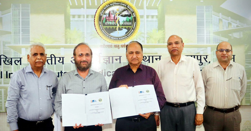 CEO of AIIMS Jammu (Prof) Dr Shakti Kumar and VC of JSS Academy of Higher Education & Research Prof (Dr) Surinder Singh displaying copies of MoU. CEO of AIIMS Jammu (Prof) Dr Shakti Kumar and VC of JSS Academy of Higher Education & Research Prof (Dr) Surinder Singh displaying copies of MoU.