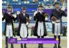 Indian Dressage Team posing with Gold Medal.