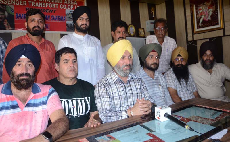 AJKTWA chairman Ajit Singh, flanked by others, addressing a press conference in Jammu on Thursday. -Excelsior/Rakesh AJKTWA chairman Ajit Singh, flanked by others, addressing a press conference in Jammu on Thursday. -Excelsior/Rakesh