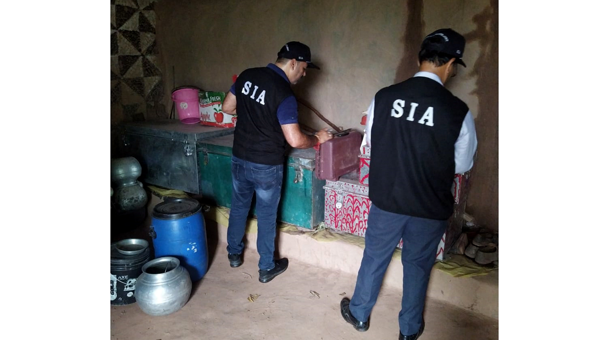 SIA jawans during search in a house at Reasi district on Thursday. SIA jawans during search in a house at Reasi district on Thursday.