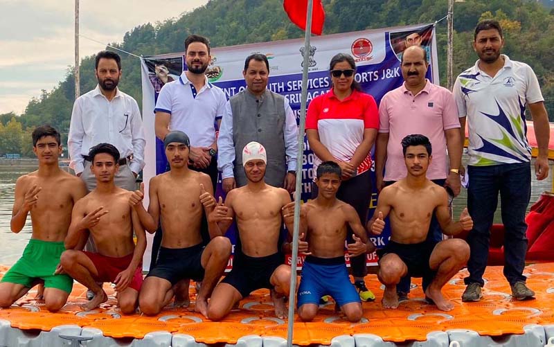 Swimmers posing with dignitaries during selection trials at Srinagar. Swimmers posing with dignitaries during selection trials at Srinagar.