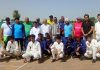 Super Seven cricket teams posing with dignitaries at Delhi.