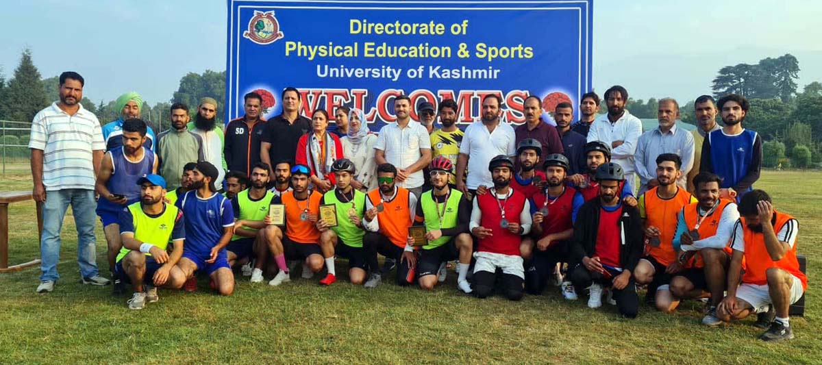 Players of Inter-departmental teams posing with dignitaries at Kashmir University on Tuesday. Players of Inter-departmental teams posing with dignitaries at Kashmir University on Tuesday.
