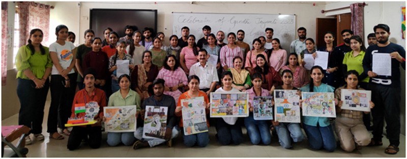 Students of Post Graduate Department of Commerce (M.Com) Government SPMR College posing with posters on Tuesday. Students of Post Graduate Department of Commerce (M.Com) Government SPMR College posing with posters on Tuesday.