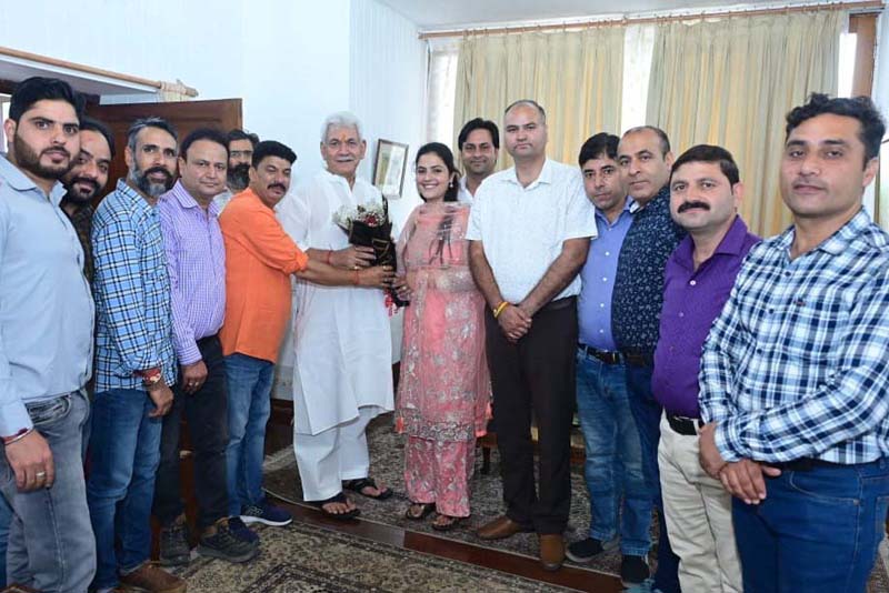 Delegation presenting bouquet to Lt. Governor Manoj Sinha. Delegation presenting bouquet to Lt. Governor Manoj Sinha.