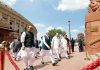 Prime Minister Narendra Modi and other Parliamentarians walking from the old parliament to the New Parliament Building, in New Delhi on Tuesday. (UNI)