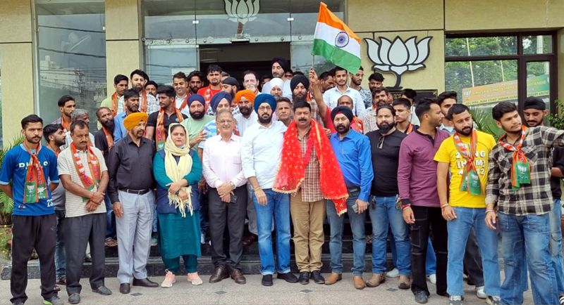 BJP leaders taking new entrants led by prominent Muslim leader, Tahir Ali Shah into party fold at Jammu on Sunday BJP leaders taking new entrants led by prominent Muslim leader, Tahir Ali Shah into party fold at Jammu on Sunday