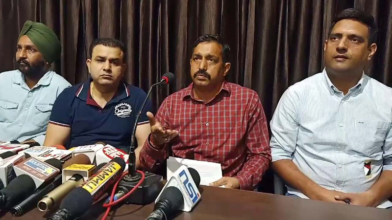 Contractor of Jammu Tawi Railway Station parking, Ravinder Manhas, addressing a press conference on Monday. Contractor of Jammu Tawi Railway Station parking, Ravinder Manhas, addressing a press conference on Monday.