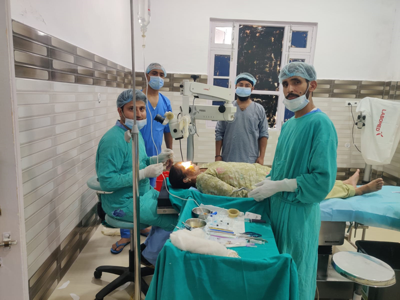 Doctors and technicians while performing cataract surgery on a patient at DH Poonch. Doctors and technicians while performing cataract surgery on a patient at DH Poonch.