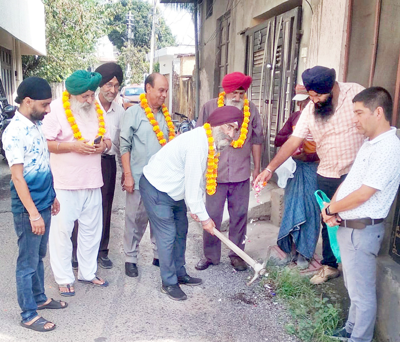 JMC Councillor, Inder Singh Soodan starts tile work at Nanak Nagar. JMC Councillor, Inder Singh Soodan starts tile work at Nanak Nagar.