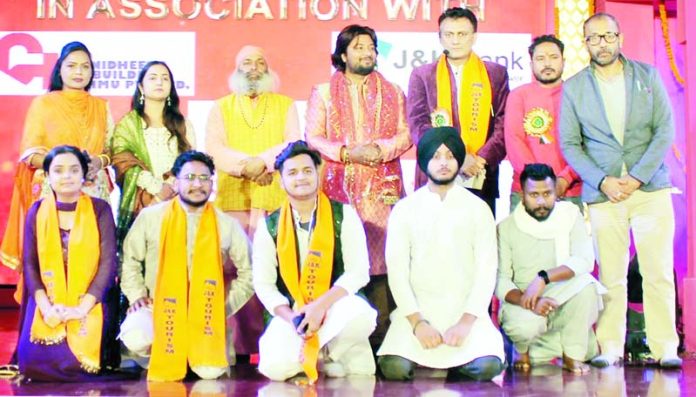 Organizers and guests of Devotional Song Competition with winners of the preliminary round on inaugural day.