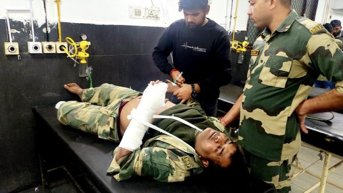 PTI10_17_2023_000427B An injured BSF personnel undergoes treatment for a bullet injury in a firing incident along the International Border (IB), at GMC hospital, in Jammu