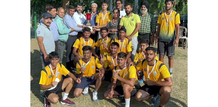 Winning team Jammu posing with trophy.