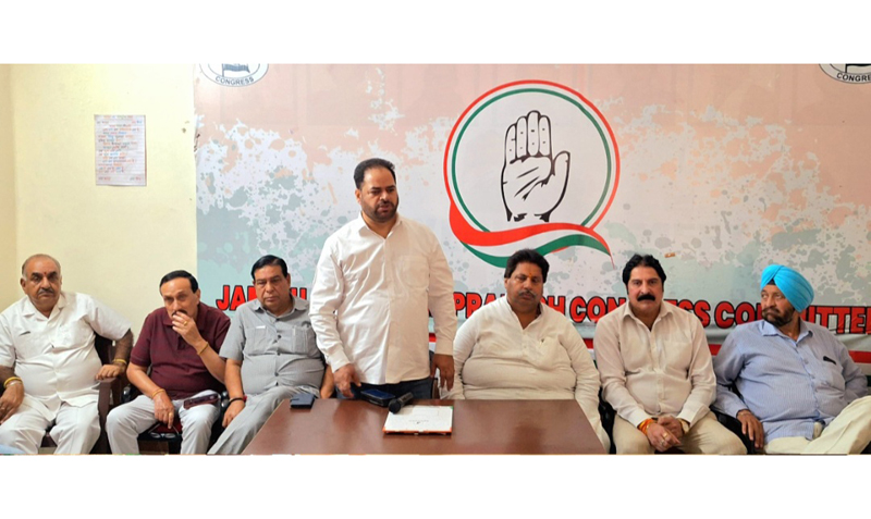 JKPCC chief Vikar Rasool Wani flanked by Raman Bhalla and others addressing party meeting in Jammu. JKPCC chief Vikar Rasool Wani flanked by Raman Bhalla and others addressing party meeting in Jammu.