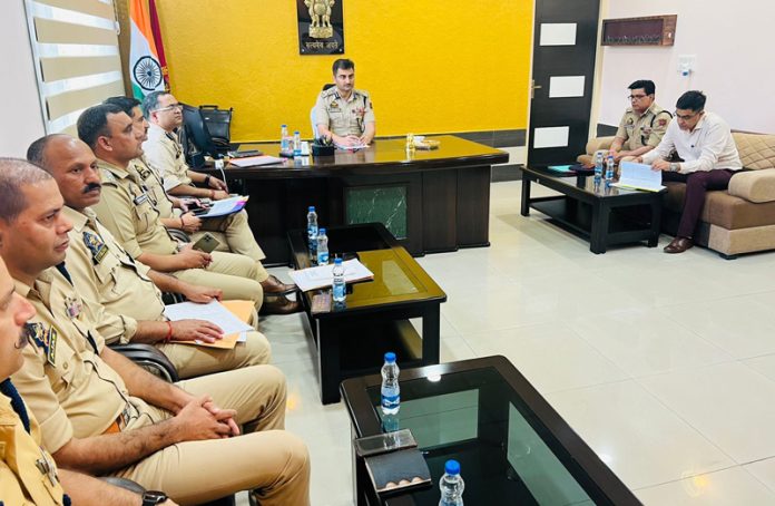 DIG UR Range, Mohammad Suleman Choudhary, chairing a meeting of the police officers in Reasi on Saturday.