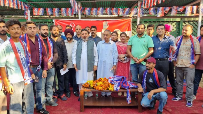Apni Party president Altaf Bukhari alongwith new entrants during function at Party office in Jammu.