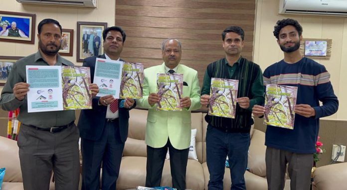 Vice-Chancellor of BGSBU and others releasing the book. Vice-Chancellor of BGSBU and others releasing the book.