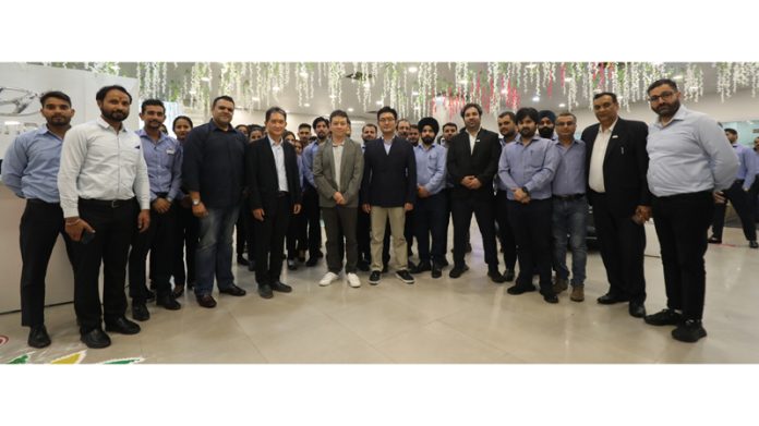 Prominent Hyundai Mobis executives with AM Hyundai management and staff in Jammu on Monday. Prominent Hyundai Mobis executives with AM Hyundai management and staff in Jammu on Monday.