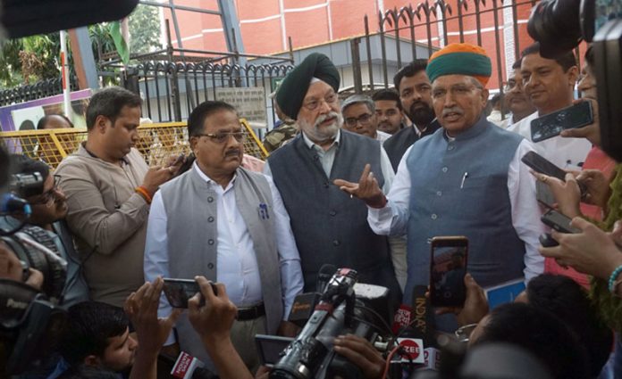 BJP delegation comprising Union Ministers Hardeep Singh Puri, Arjun Meghwal party leaders Radha Mohan Agarwal, Anil Baluni, Om Pathak talking to newsmen while coming out of Election Commission after meeting Chief Election Commissioner, in New Delhi on Wednesday. (UNI) BJP delegation comprising Union Ministers Hardeep Singh Puri, Arjun Meghwal party leaders Radha Mohan Agarwal, Anil Baluni, Om Pathak talking to newsmen while coming out of Election Commission after meeting Chief Election Commissioner, in New Delhi on Wednesday. (UNI)