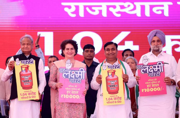 Congress General Secretry Priyanka Gandhi with Rajasthan Chief Minister Ashok Ghalot at a public meeting in Jhunjhuni on Wednesday. (UNI)