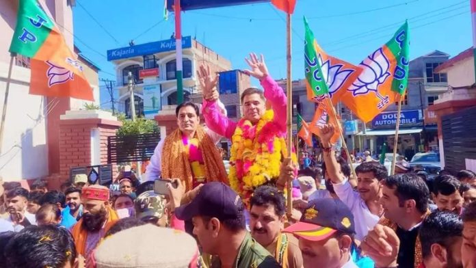 BJP president Ravinder Raina leading a massive rally in Doda on Friday.