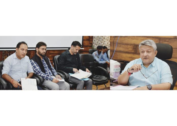 DC Doda Vishesh Mahajan chairing a meeting on Friday. DC Doda Vishesh Mahajan chairing a meeting on Friday.