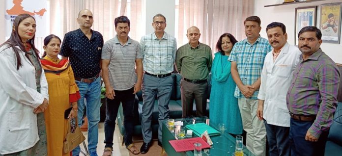 Principal GMC Jammu Dr Ashutosh Gupta, Dr Manu Bhatnagar (Additional Director, JKACS) and others posing together after signing an MoU. Principal GMC Jammu Dr Ashutosh Gupta, Dr Manu Bhatnagar (Additional Director, JKACS) and others posing together after signing an MoU.