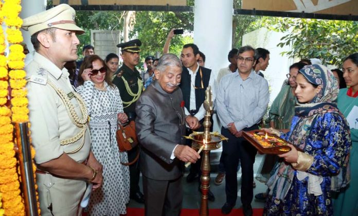 LG Ladakh, Brig (retired) BD Mishra, lighting the ceremonial lamp to inaugurate the Brand Ladakh Emporium in New Delhi on Wednesday.