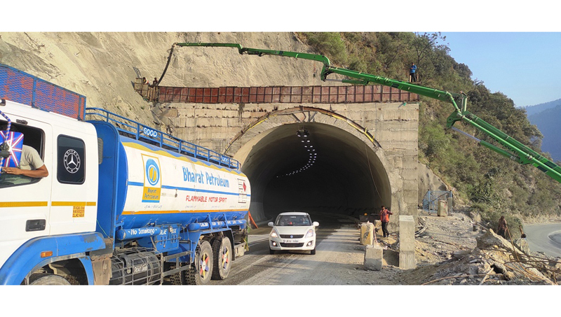 Traffic plying on Maroge tunnel after it was dedicated to the public in Ramban district on Saturday. - Excelsior/Parvaiz Mir Traffic plying on Maroge tunnel after it was dedicated to the public in Ramban district on Saturday. - Excelsior/Parvaiz Mir