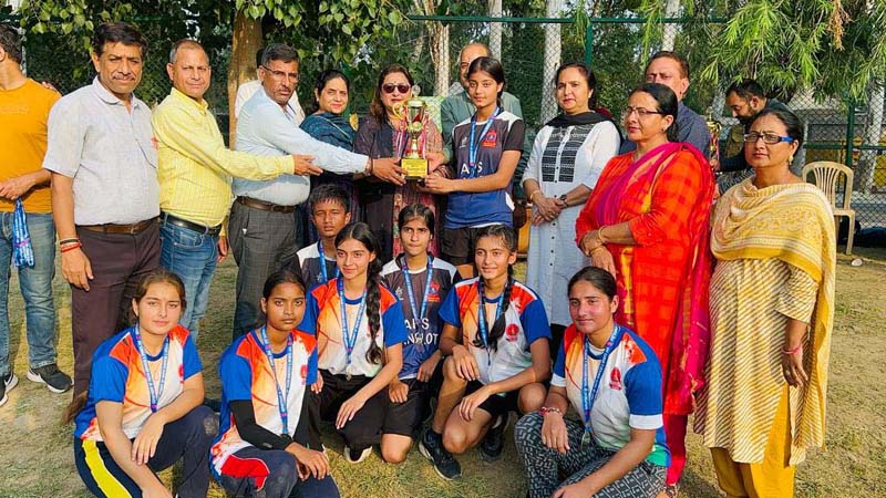 Girls Basketball team posing with winner's trophy in Udhampur. Girls Basketball team posing with winner's trophy in Udhampur.