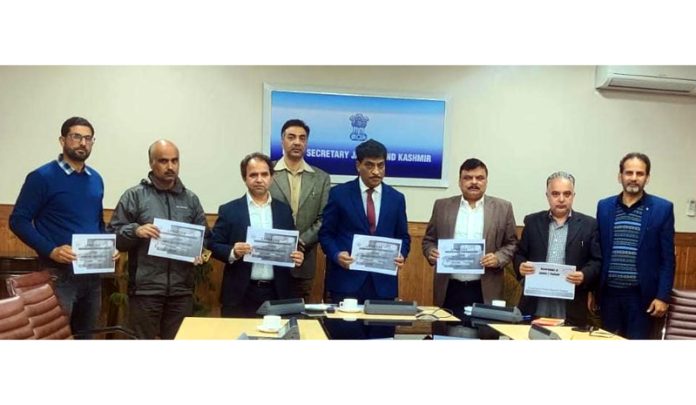 Chief Secretary Arun Kumar Mehta releasing school ranking and grading of teacher report on Thursday.